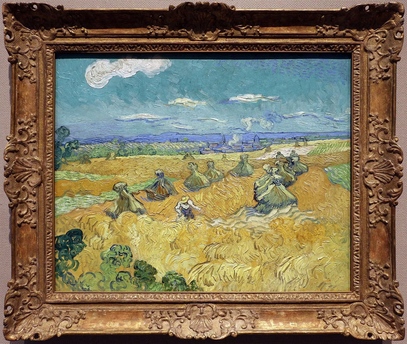 ทุ่งข้าวสาลีกับกองฟางและเครื่องเก็บเกี่ยว - Vincent van Gogh