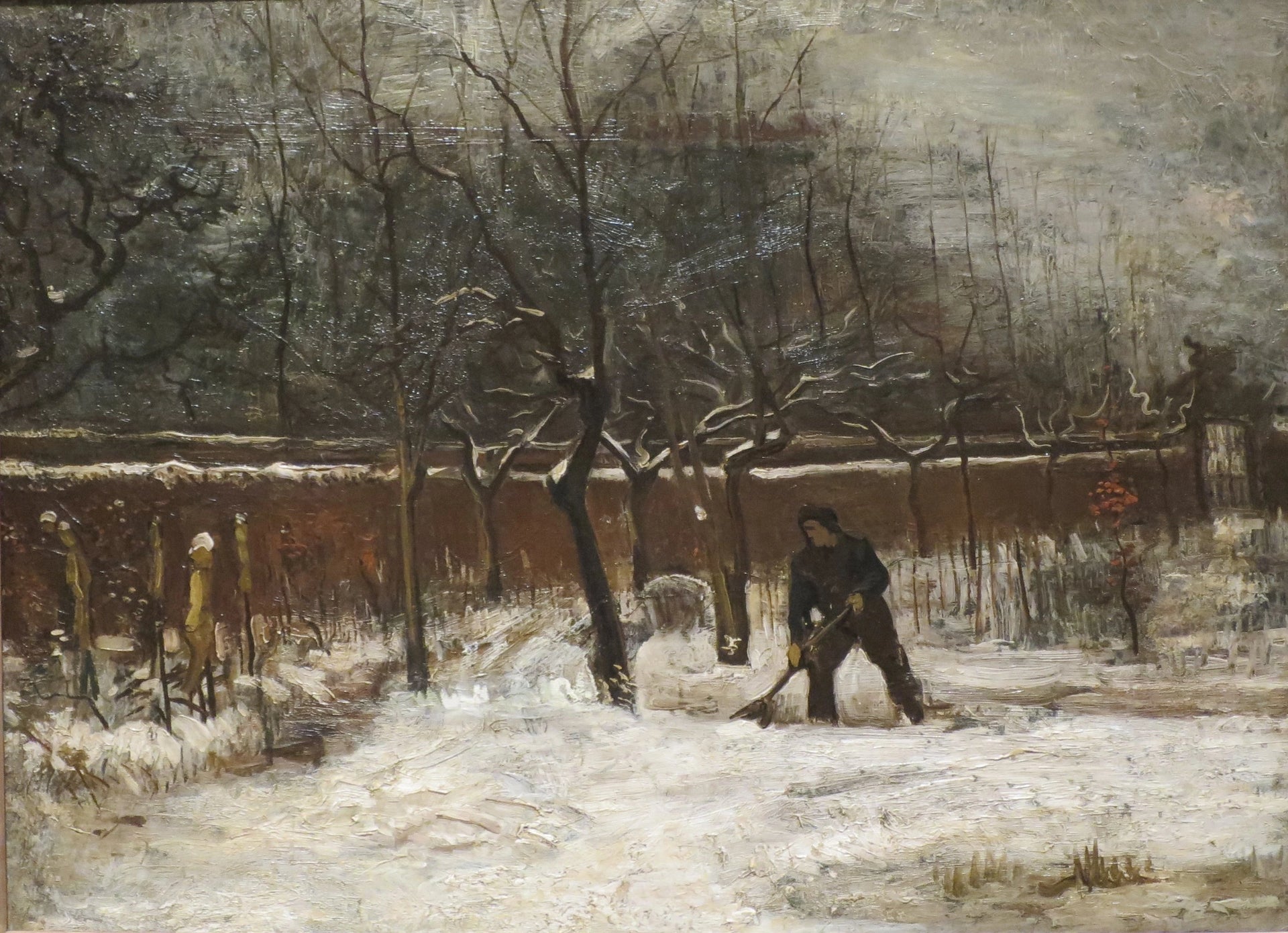 Hiver, jardin du presbytère sous la neige F194 — homme travaillant dans le jardin enneigé de Nuenen par Van Gogh
