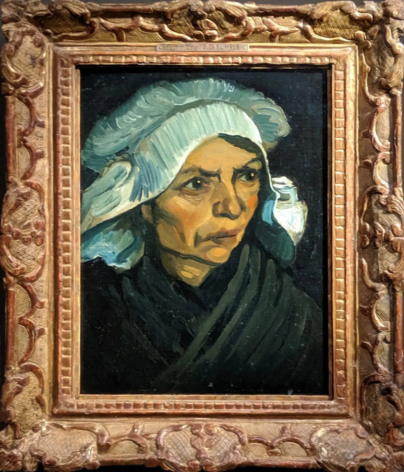 หัวหญิงชาวนาใส่หมวกขาว - Vincent van Gogh