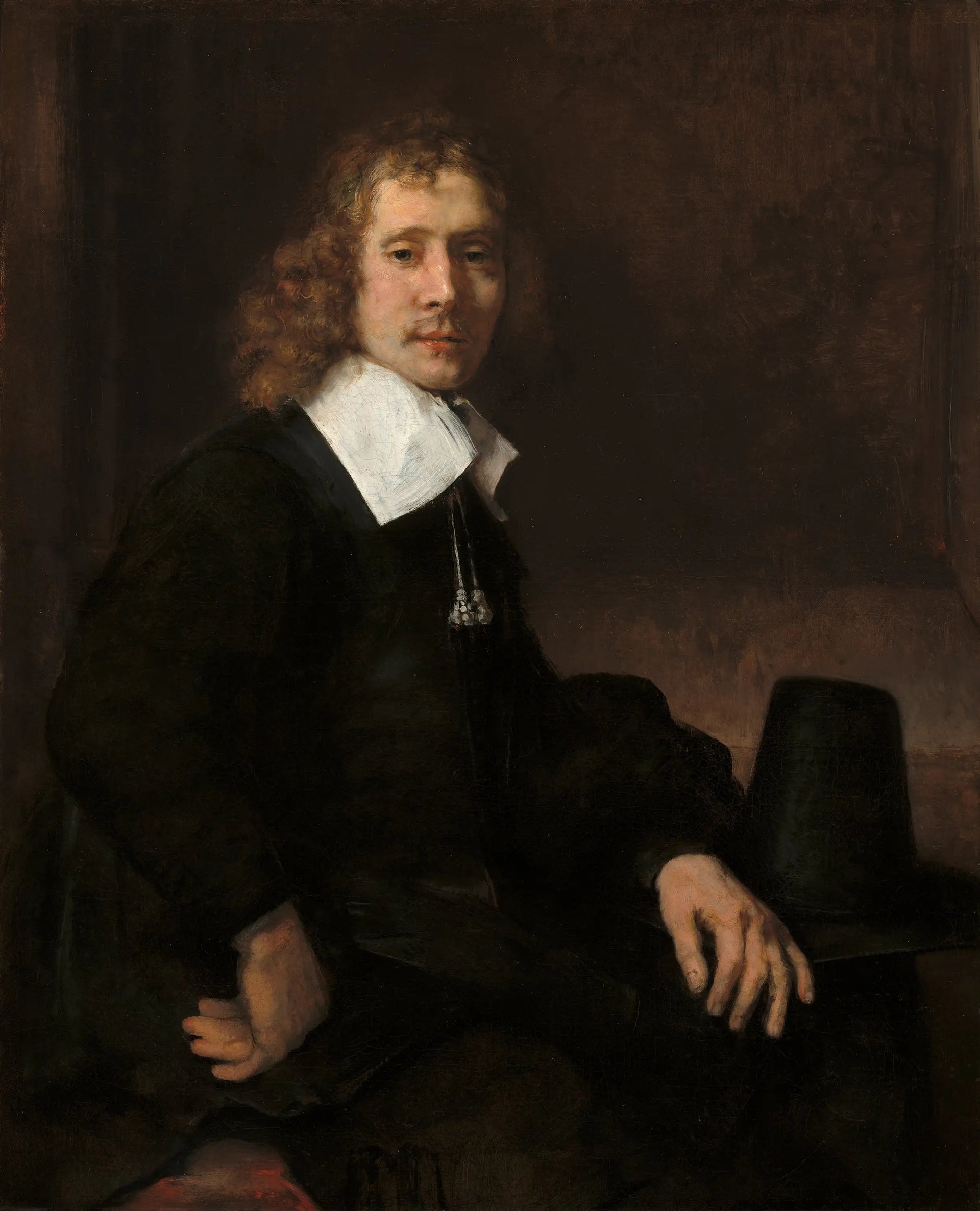 Un jeune homme assis à une table (peut-être Govaert Flinck) - Rembrandt image 1 copie de tableau peinte à la main